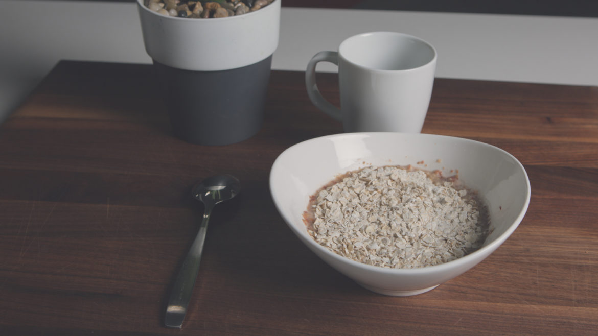 Bowl of oatmeals on timber table
